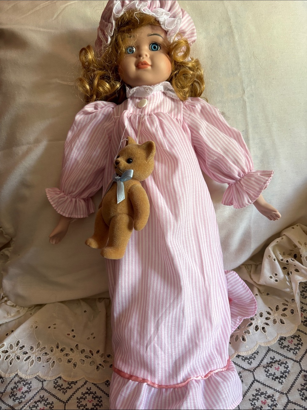 Vintage Porcelain doll Styled in Pink/ white Striped gown with Bonnet and Teddy